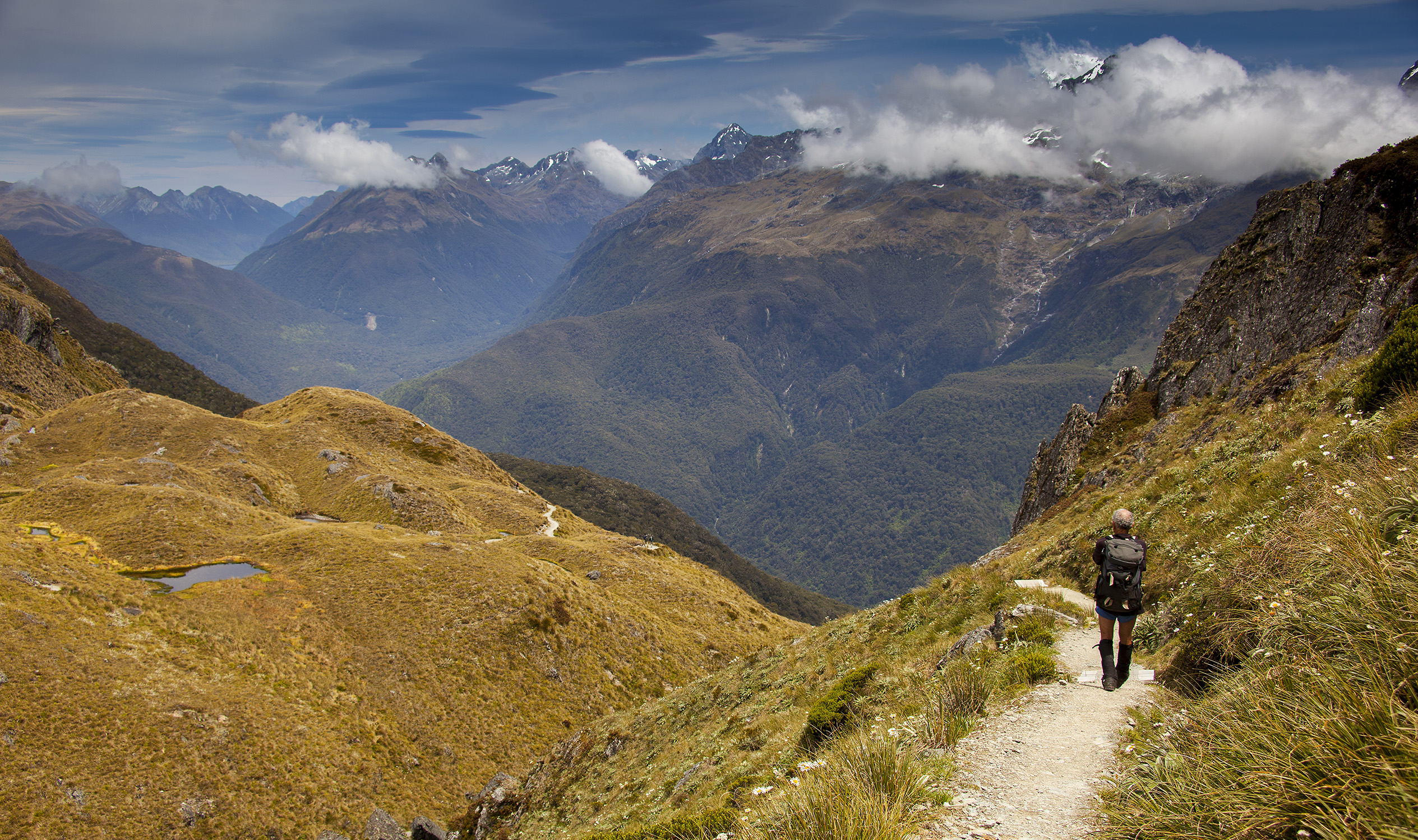 Great Walk hiking - Routeburn Track Tramper in the mountains